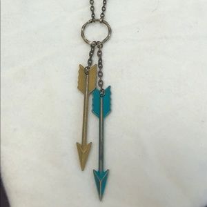 “Two Arrows” pendant necklace.